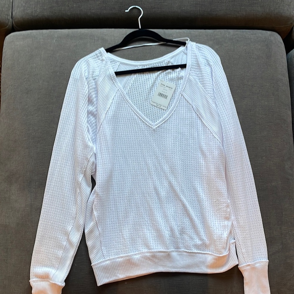 Free people long sleeve shirt. Tags on. Never worn.